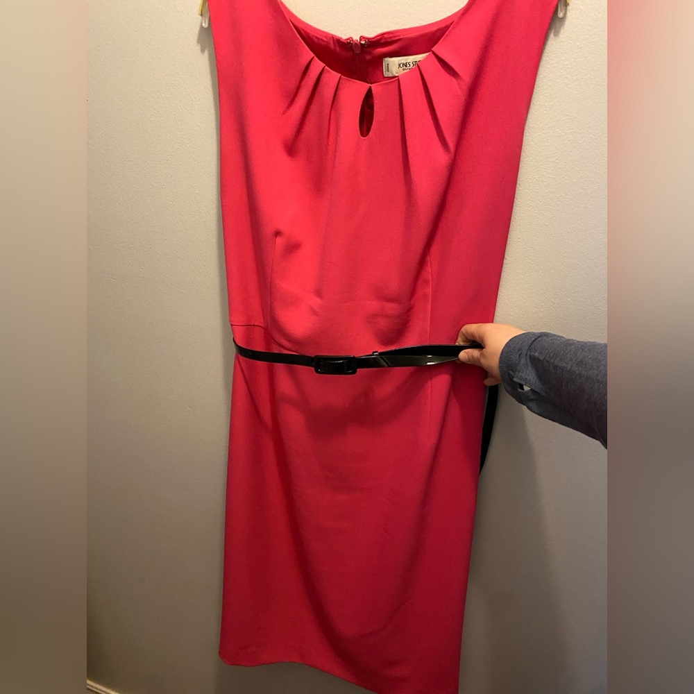 Beautiful Barbie pink sleeveless dress with black patent belt.